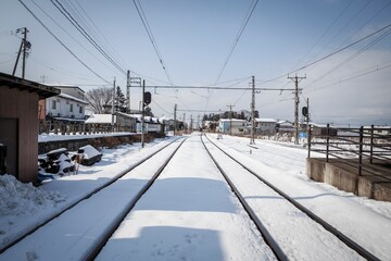Snow-Covered Railway Tracks in Winter Japan