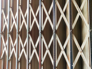 Background of the reinforcement of the folding gate which has started to rust
