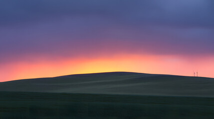 Fototapeta premium Vibrant Sunset over Rolling Hills