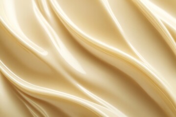Fototapeta premium close-up of smooth cream texture forming organic waves with faint shadows under soft natural light