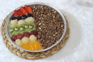 Fruit pudding combination. layered pudding with various fruit on top, and chocolate. it's a beautiful pudding with beautiful colors from the fruit