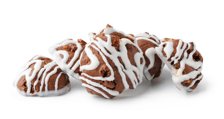Delicious chocolate cookies with white icing arranged on a clean background for a tempting dessert display