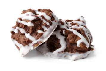 Delicious chocolate cookies with icing drizzled on top, perfect for dessert lovers
