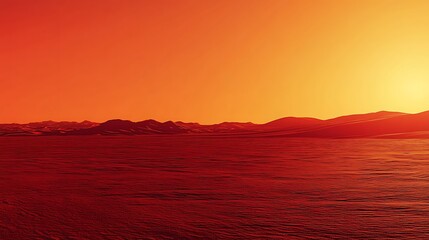 Obraz premium Red sunset over tranquil water and mountains.