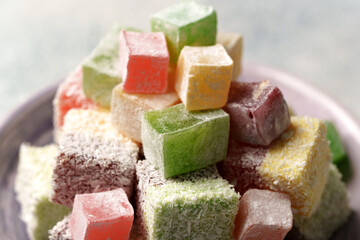 Colorful assortment of traditional Turkish delight arranged in a decorative bowl