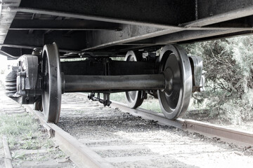 A train with its wheels on the tracks