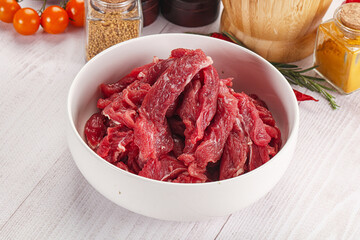Raw beef meat - sliced strips