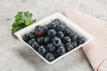 Sweet ripe blueberry on the bowl