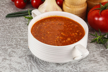Hot tomato soup with diced chicken
