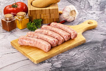 Raw meat sausages for grill