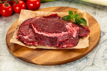 Raw beef cheeks cut for cooking