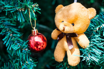 Christmas Tree Ornament with a Cute Brown Teddy Bear and Golden Holiday Decorations