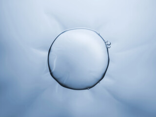 Macro close up of soap bubbles look like scientific image of cells division process, Concept of cell divides into two cells