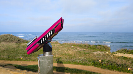 galaxy  binoculars logo brand and sign text on the boulevard for looking over the sea