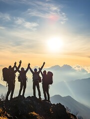 A photo of a group of hikers celebrating together at the top of a mountain.
