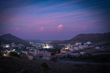 Landscape view of a city, View of Al hada City, Taif in Evening from the mountain top