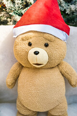 Cute Plush Teddy Bear Dressed as Santa Claus for Christmas Celebration