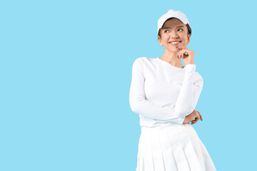 Pretty young girl on blue background