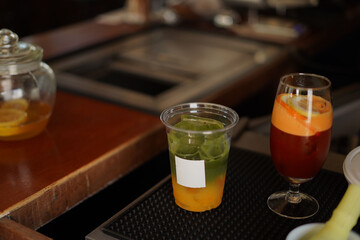 a cup of matcha green tea on the table