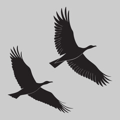 Naklejka premium two birds flying silhouette design art and illustration
