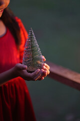 A little girl is happy to join the christmas day.