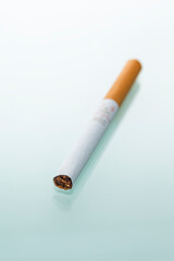 Lifestyle Concepts. Separate One Cigarette Placed Isolated Over White Background