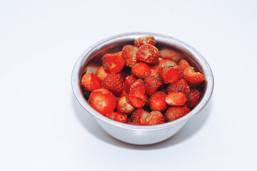bowl of strawberries isolated on white background