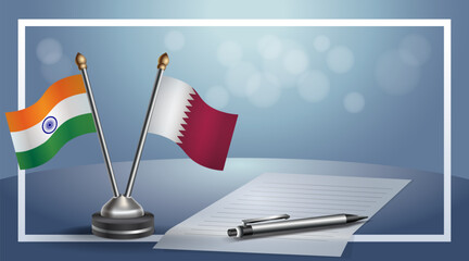 India and Qatar National flags on small table with bokeh background, cooperative relationship