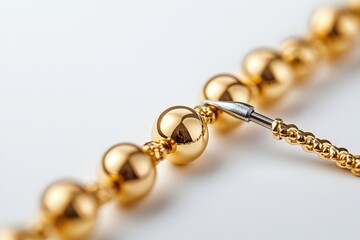 Close-Up of Gold Necklace with Clasp Detail