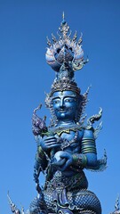 statue of buddha in the blue temple