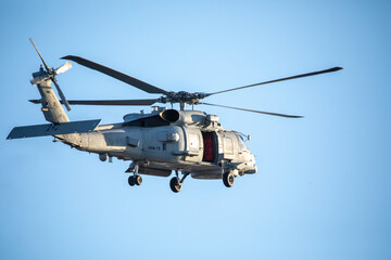 A U.S. Navy Helicopter Flying Overhead
