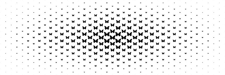 horizontal halftone of black butterfly spread from center for pattern and background.