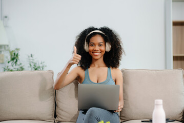 Woman enjoys a fresh salad with fruits and juice, embodying wellness, nutrition, and vitality