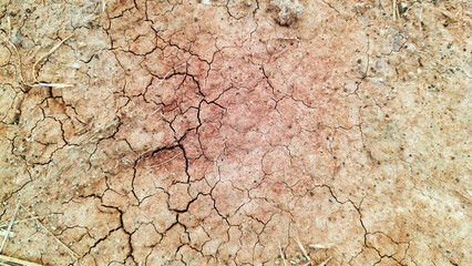 The ground has cracks in the top view for the background