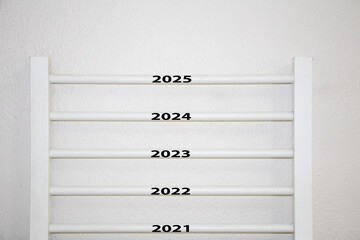 New Year 2025 is coming concept idea. Happy new year 2025 replace 2024. White stair treads....