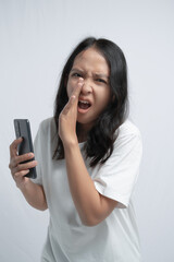 Fototapeta premium Woman Holding Phone and Whispering a Secret