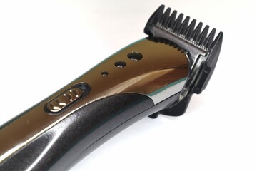 Obraz premium A hair clipper is shown against a white background.