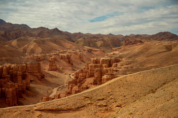 beautiful landscape, orange canyon mountains and cloudy sky