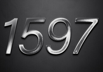 Chrome metal 3D number design of 1597 on grey background.