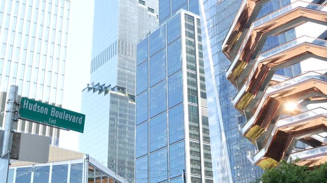 New York City, United States. Hudson Yards urban architecture in Chelsea, Manhattan Midtown, NYC, USA. New modern high-rise glass skyscrapers, american business buildings and real estate. Road sign.