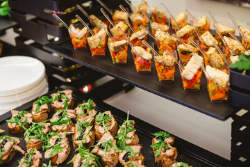 A contemporary hotel dining area featuring a sleek buffet setup.