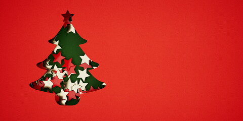 Christmas theme showcasing a tree cutout filled with golden and red stars on a vibrant green backdrop, capturing holiday creativity and joy.