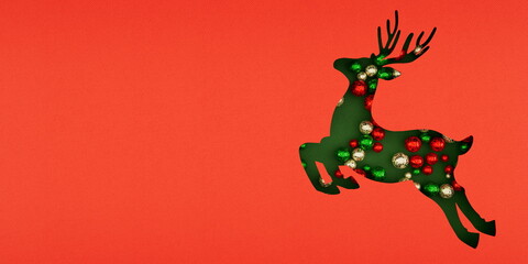 reindeer cutout filled with colorful ornaments on a vibrant green backdrop, capturing the essence of holiday cheer and creative decoration