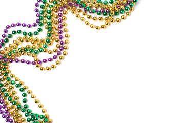 Mardi gras beads on white background