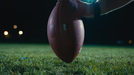 Cinematic shot of American Football player Kickoff Game Start. Static Close-up of Ball Being Kicked by the Professional Player. Gates Goal Kick. Successful Team Scores and Wins Championship. - Powered by Adobe