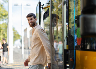 Fototapeta premium Young tourist exiting bus in lisbon, portugal, embarking on urban adventure