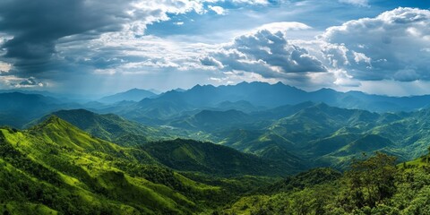 Naklejka premium Majestic green mountains rise majestically, displaying a stunning symphony of nature s hues against a vast open sky, where the beauty of majestic green mountains captivates all who behold.