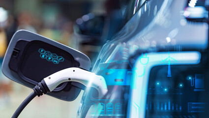 Generated imageClose-up of an electric car charging, featuring a futuristic digital interface overlay with icons and renewable energy symbols.
