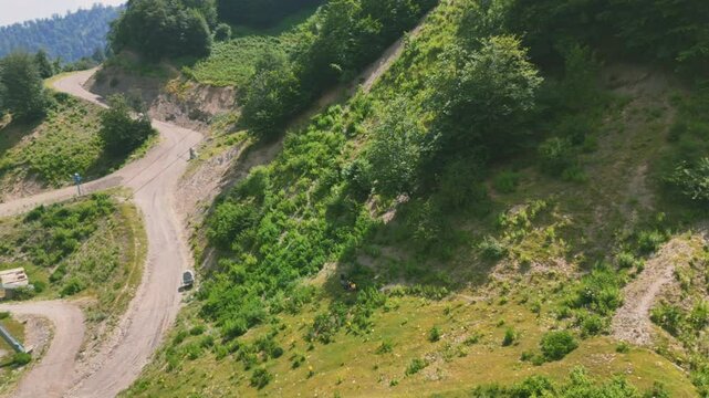 Aerial view of the green mountainous landscape with lush forest around Gabala city