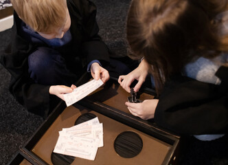 Kids go through tasks in the quest room and look for keys. Adventures of friends in a magical labyrinth, logic tests